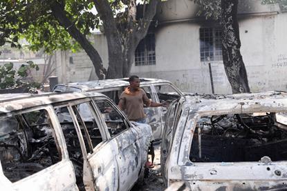 2024-03-25T233047Z_1594725214_RC25T6AQG5NW_RTRMADP_3_HAITI-VIOLENCE